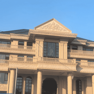 张家口黄金麻别墅外墙干挂石材效果示例