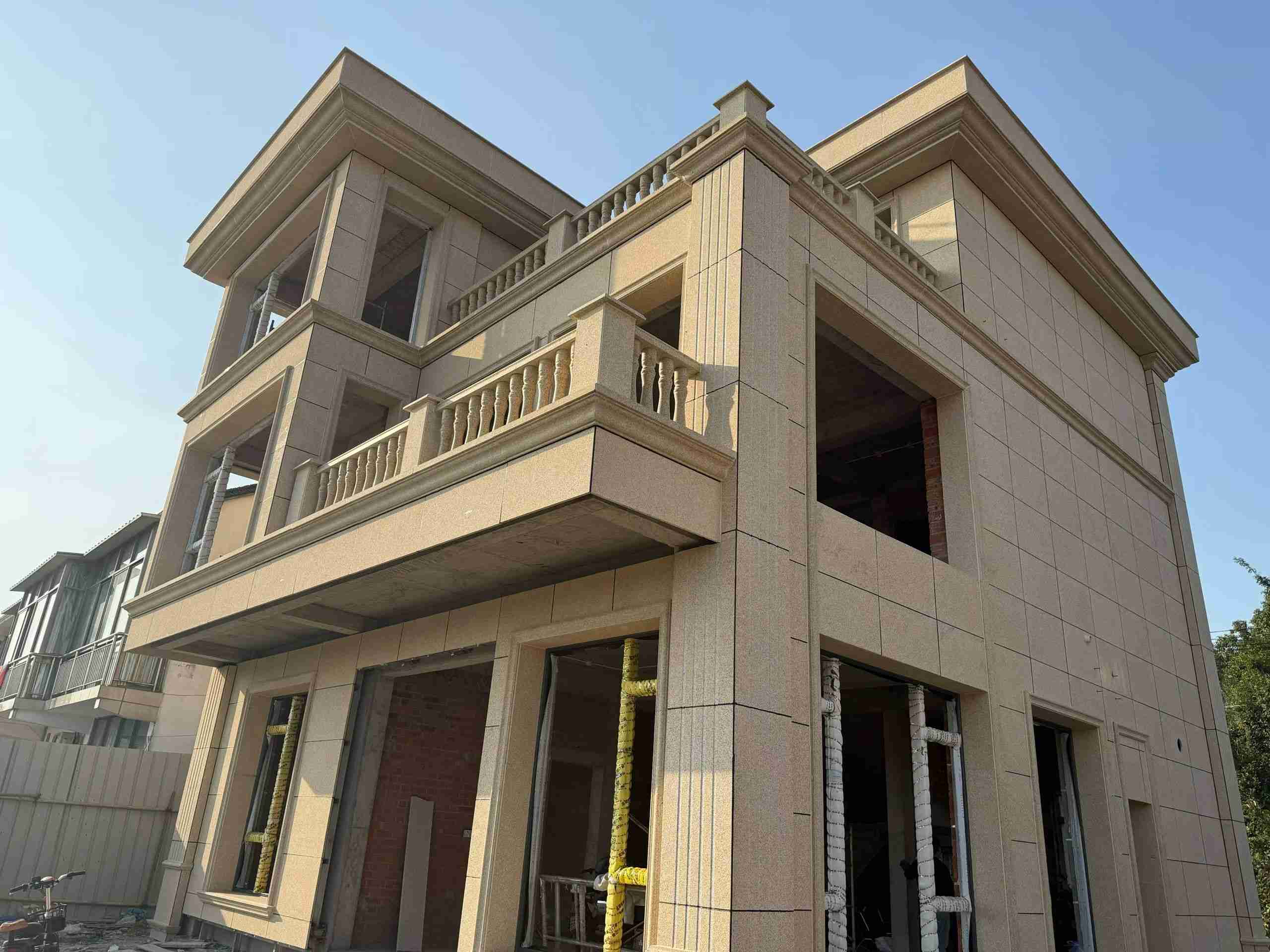 张家口 黄金麻花岗岩石材荔枝面外墙干挂效果展示